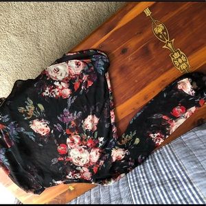 Sheer rose print top with red liner tank. Belgium